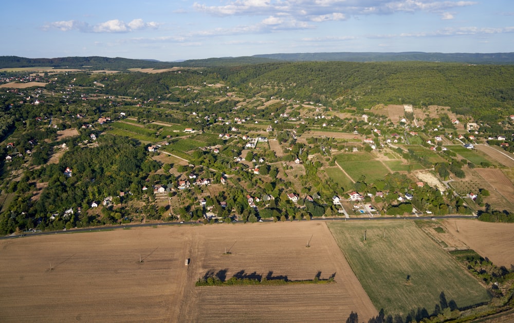 a landscape with houses and trees