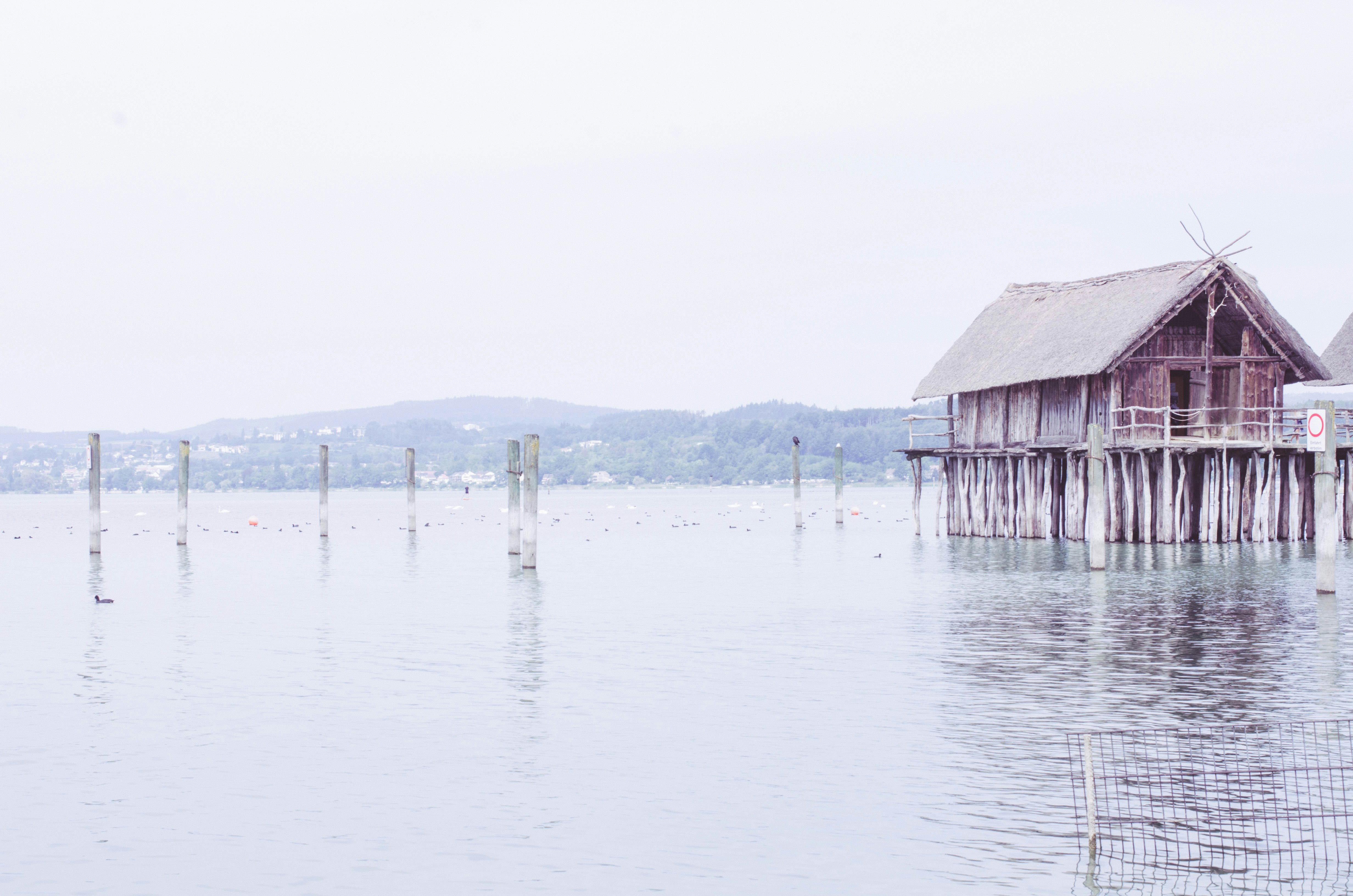 a building on a dock in a lake