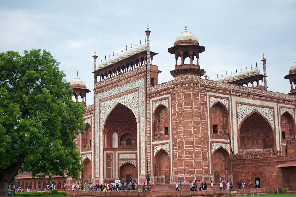 a large brick building with domed roofs