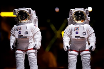 two people in space suits
