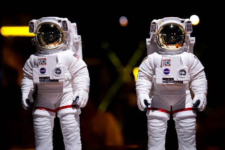 two people in space suits