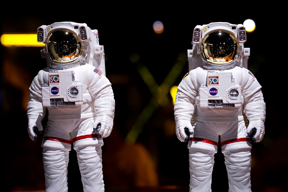 two people in space suits