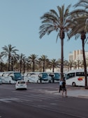 A row of buses lined up at the loading dock, ready for shipment to Africa.