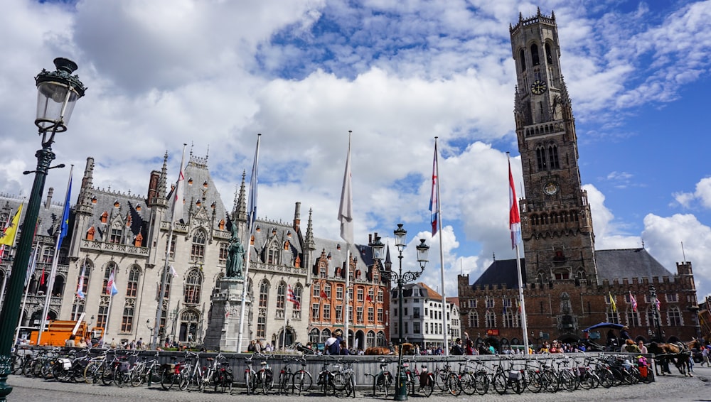 a large building with towers and flags