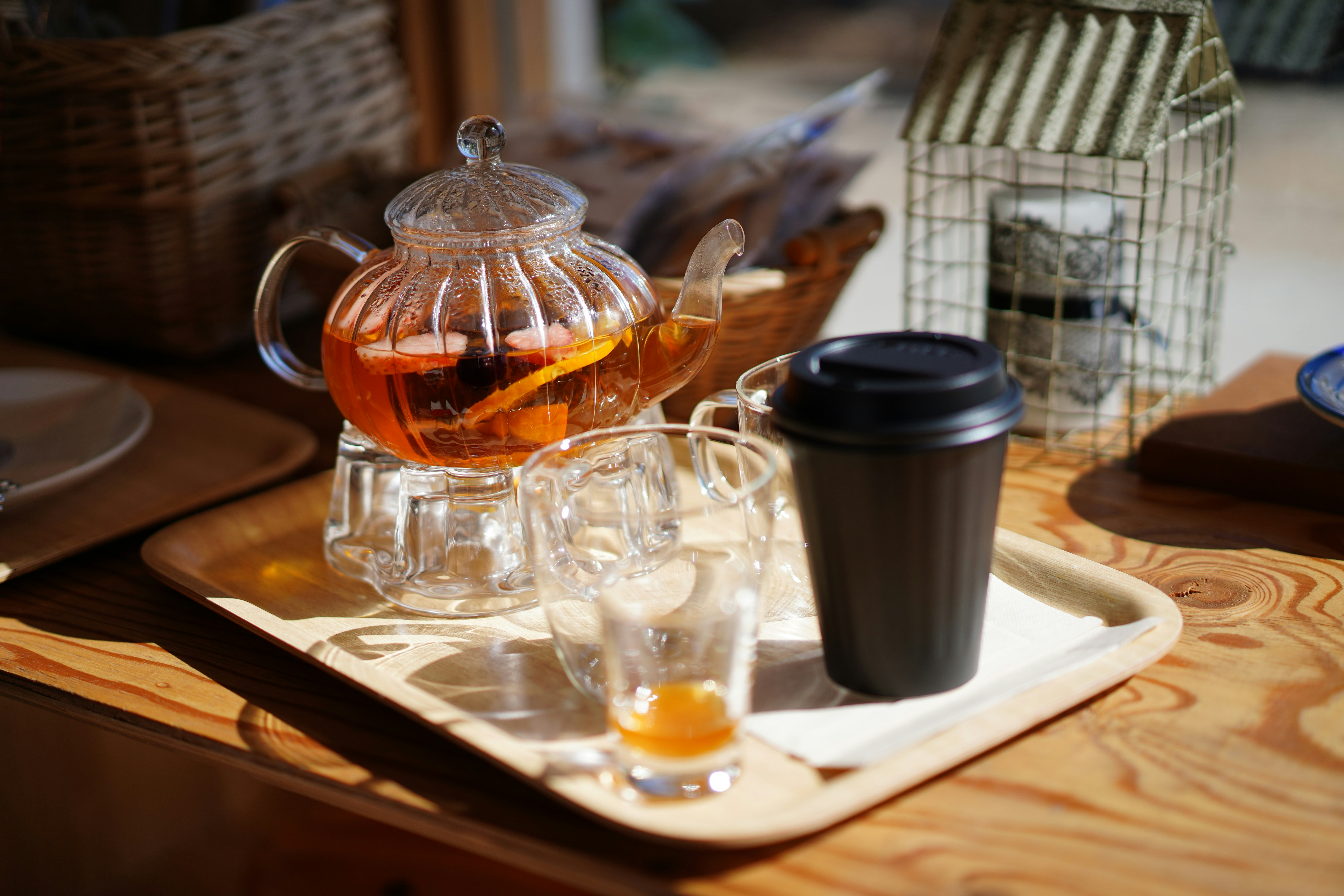 A glass teapot and cups on a table photo Free Tea Image on Unsplash