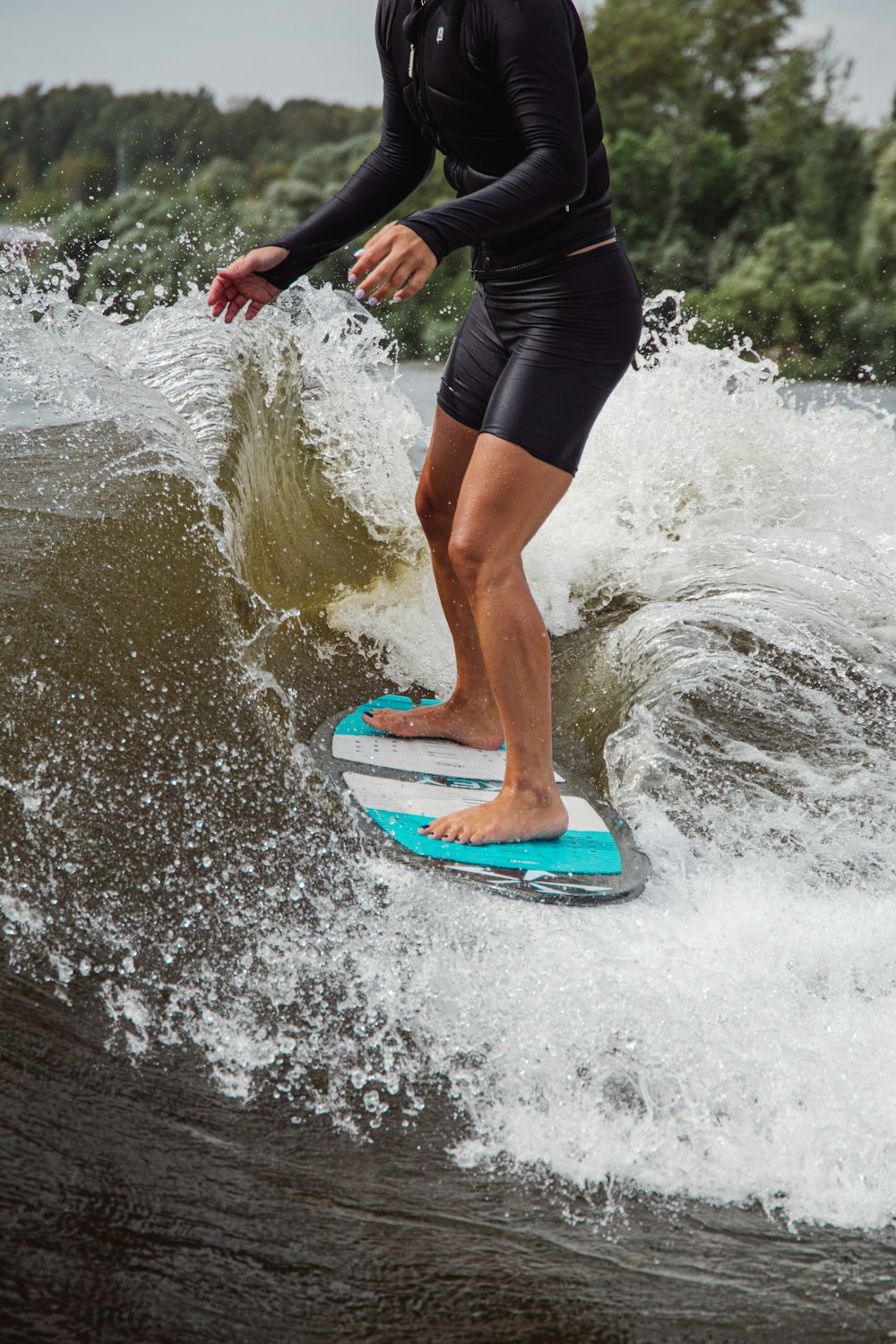 a person surfing on the waves