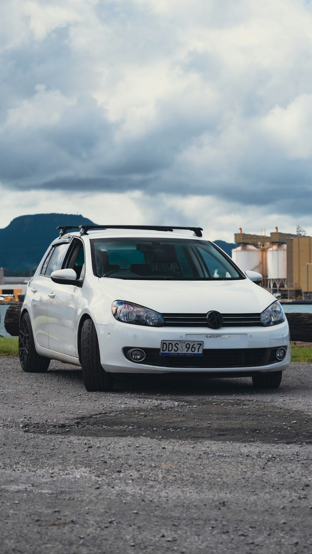 a white car parked on a road