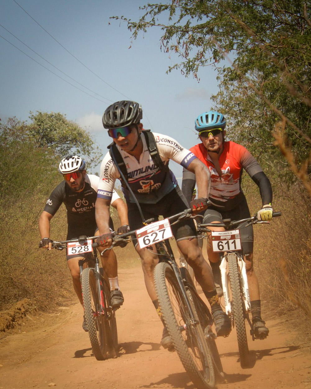 a group of men riding bikes