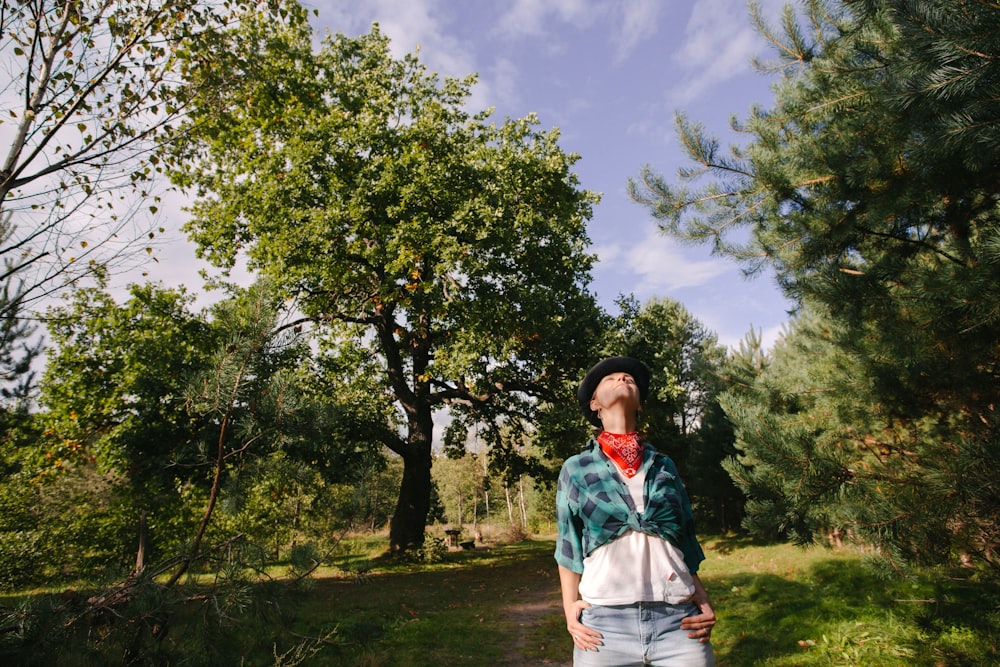 a man standing in a forest