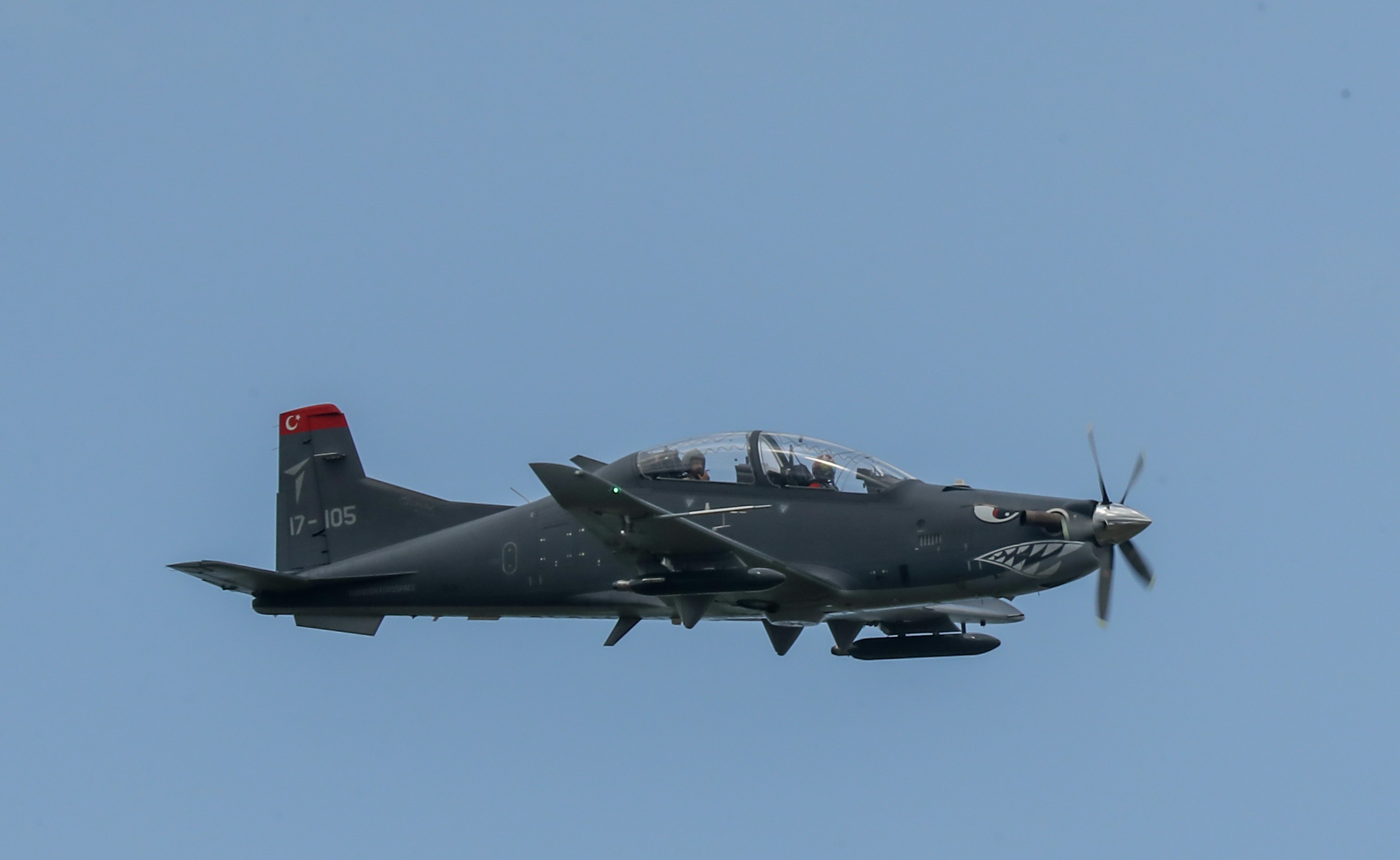 a fighter jet flying in the sky
