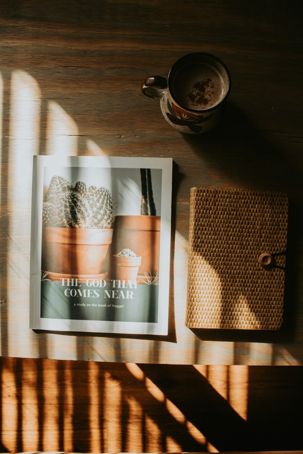 a book and a cup of coffee