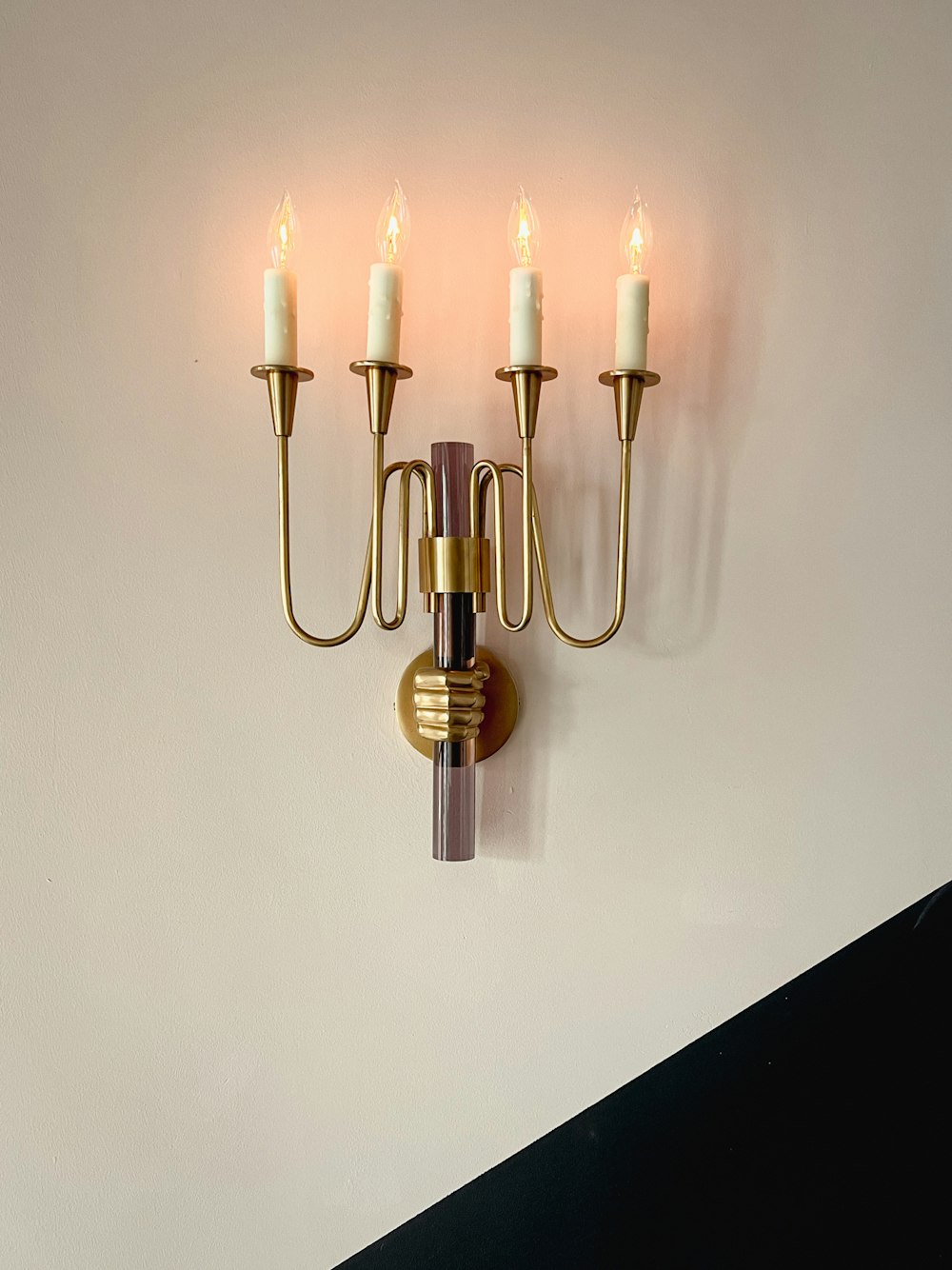 a chandelier with candles