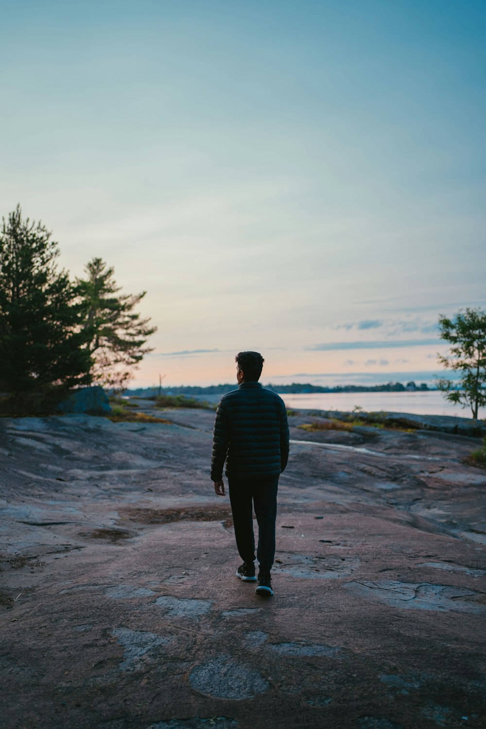 a man standing on a beach