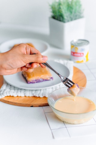 a person eating a dessert