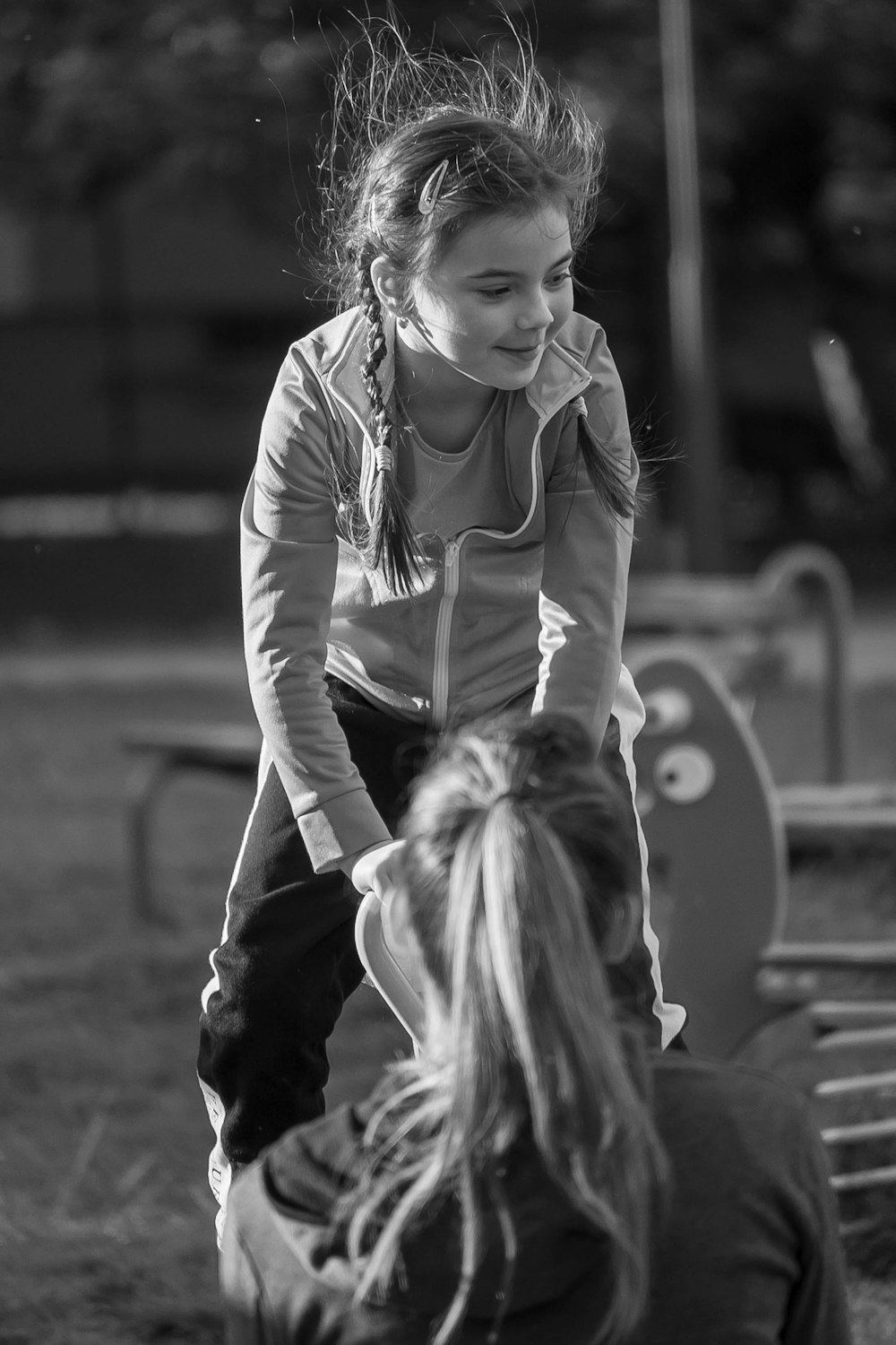 a person with the hair in a ponytail