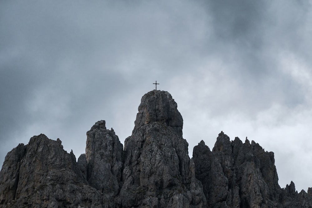 a cross on top of a mountain