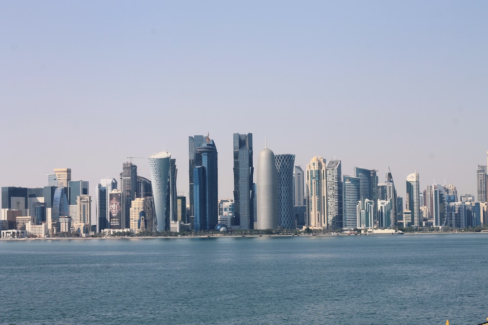 a city skyline by the water