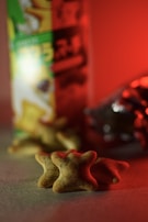 A behind-the-scenes look at a photoshoot featuring artisanal fruit snacks and elegant packaging.