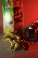 A behind-the-scenes look at a photoshoot featuring artisanal fruit snacks and elegant packaging.
