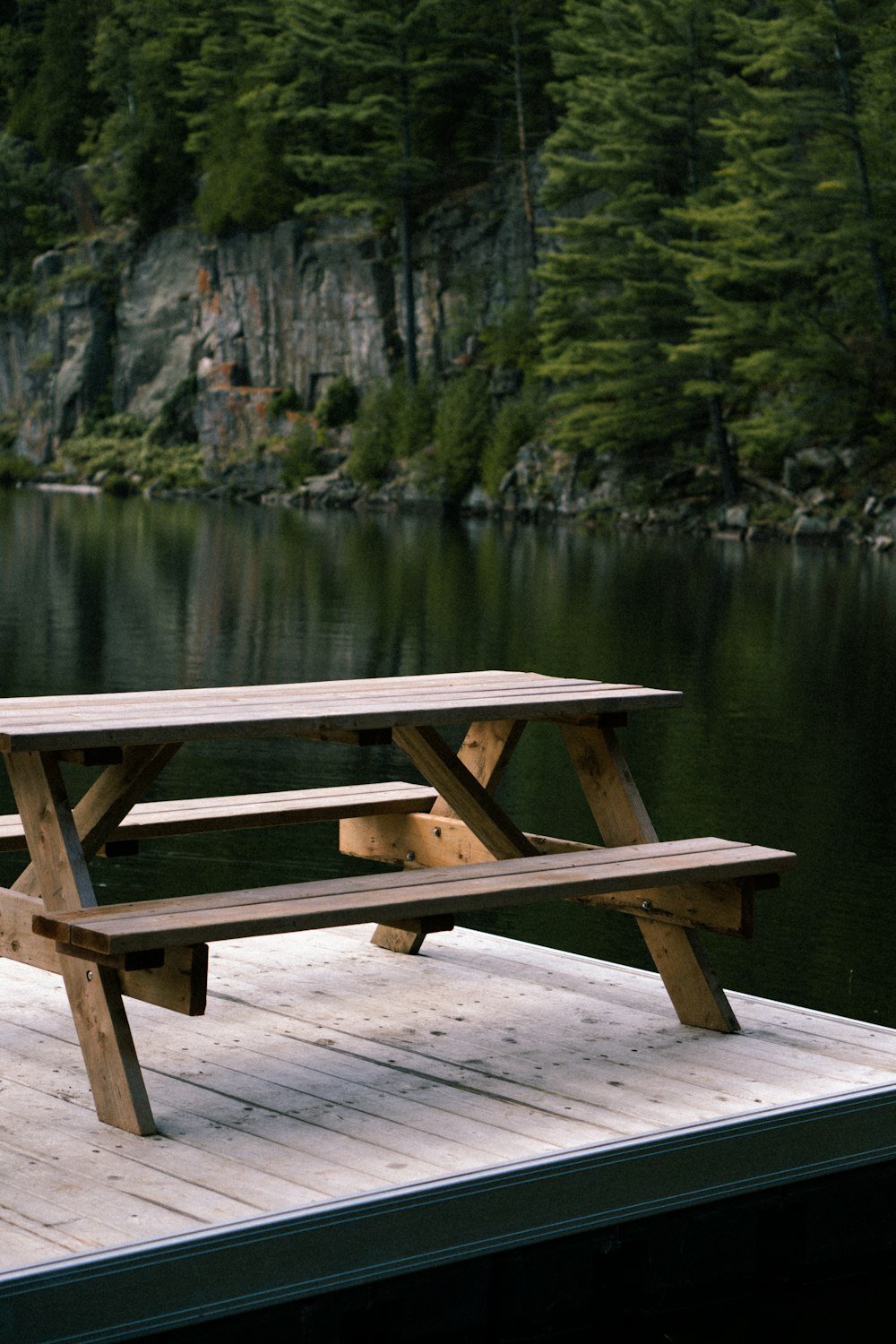 a picnic table on a dock