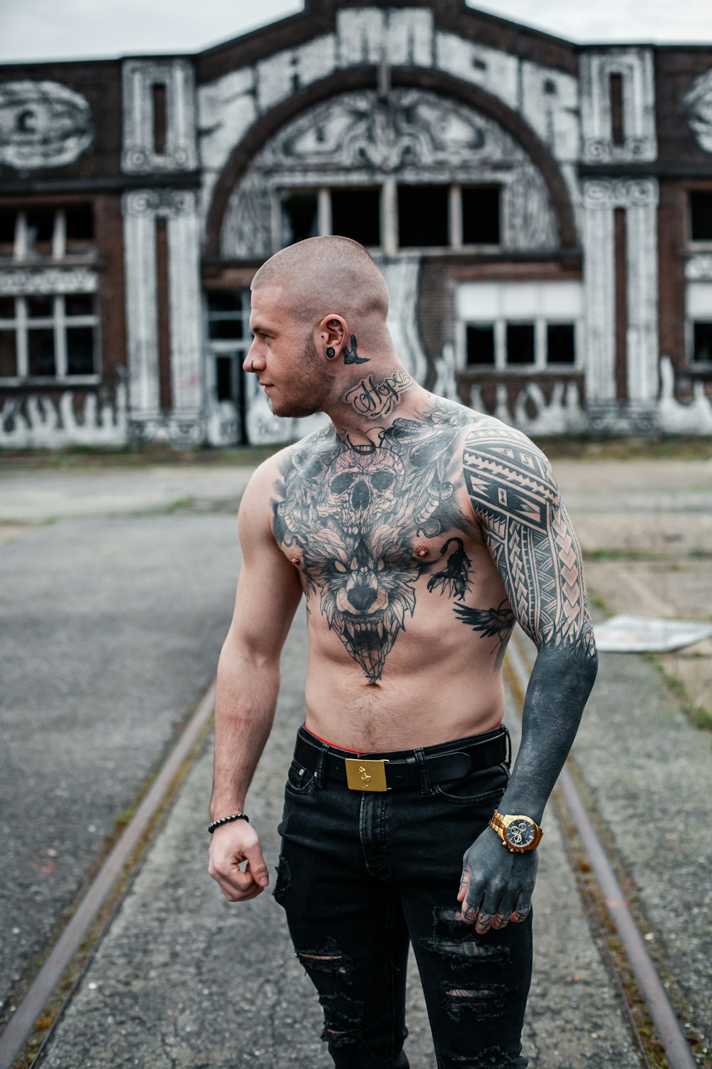 a man standing in front of a building