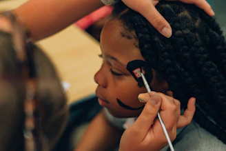 a person getting the hair done