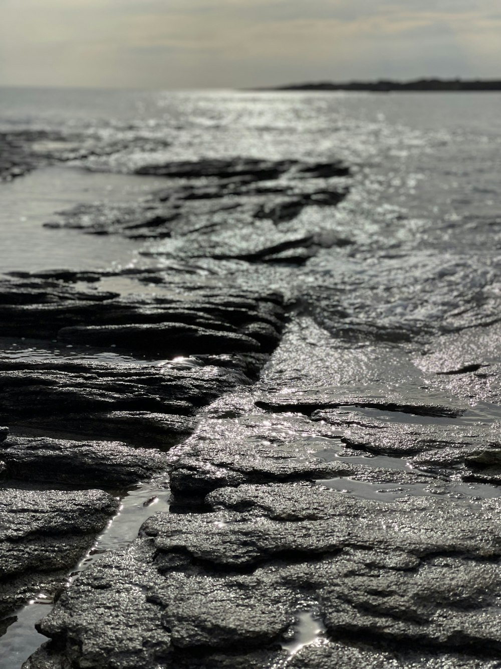 a rocky beach with waves