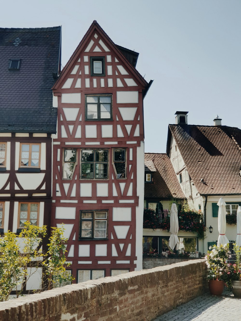 a red building with a white roof