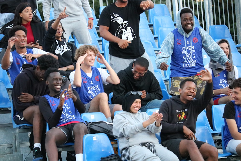 a group of people sitting on a roller coaster