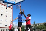 a group of people jumping in the air