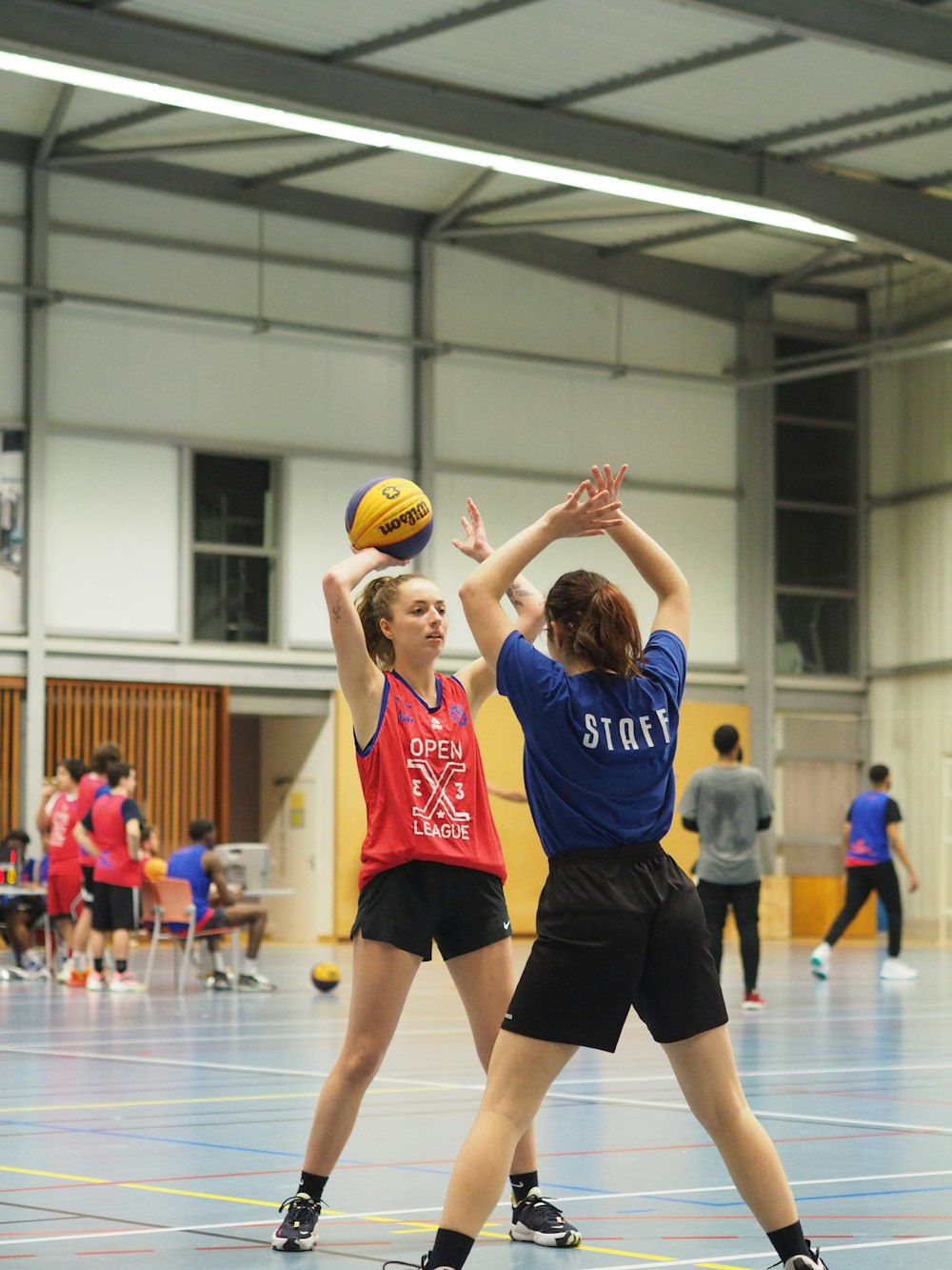 a couple of women playing volleyball