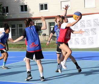 a group of people playing volleyball