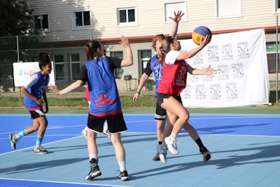 a group of people playing volleyball
