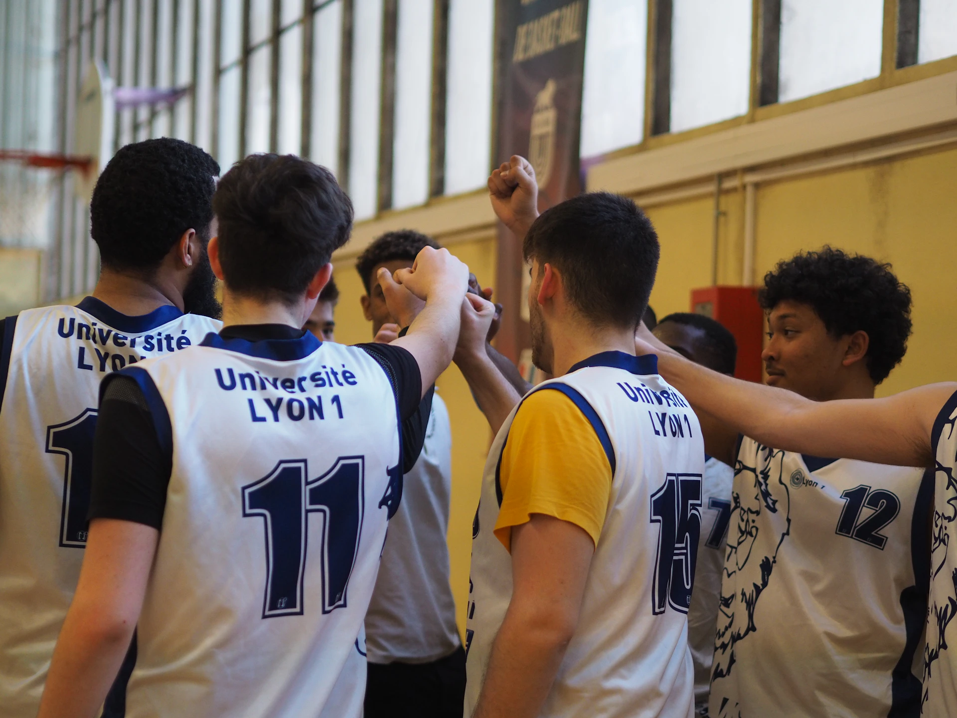a group of men in sports uniforms