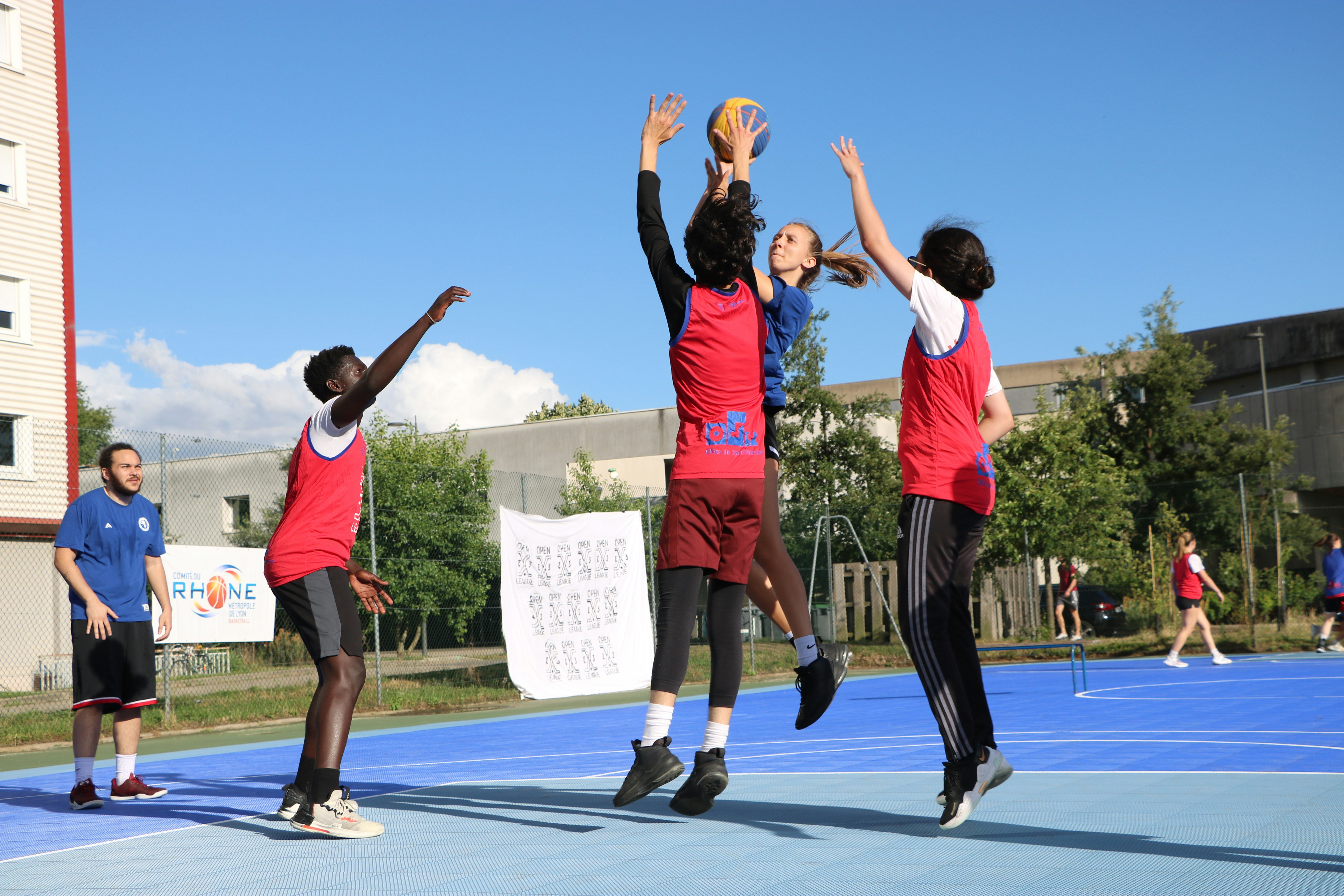 Pickleball doubles partners high-five after successful point, demonstrating strategic communication and teamwork on court