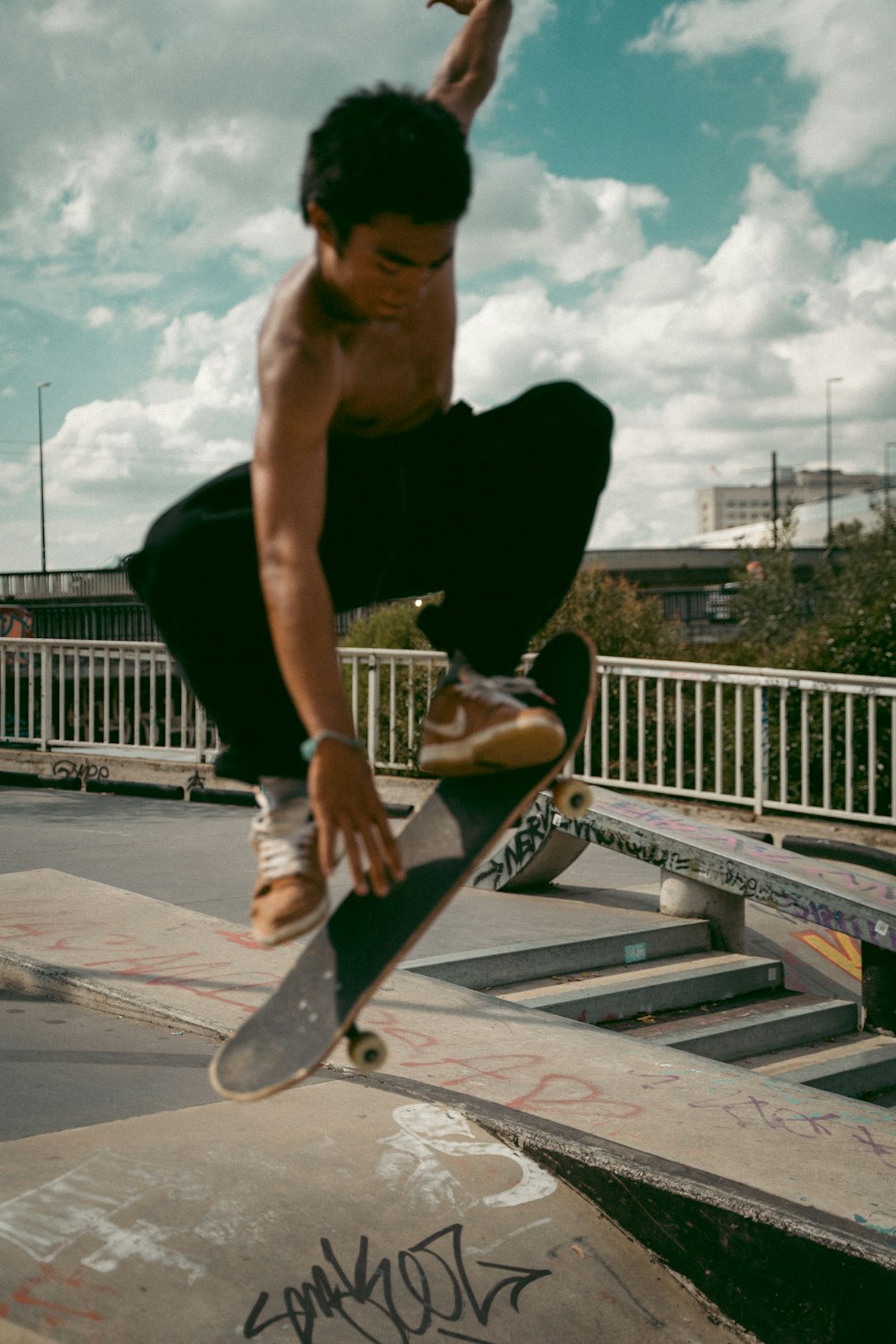 a man doing a trick on a skateboard