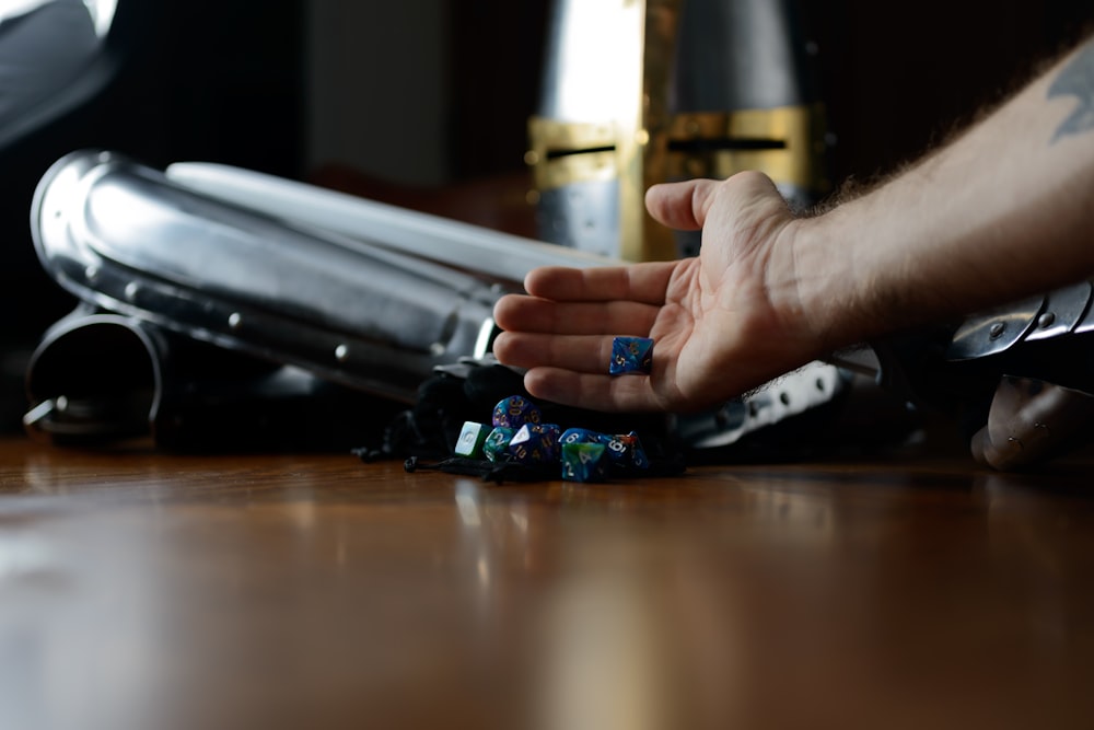 a person's hands on a touch screen device