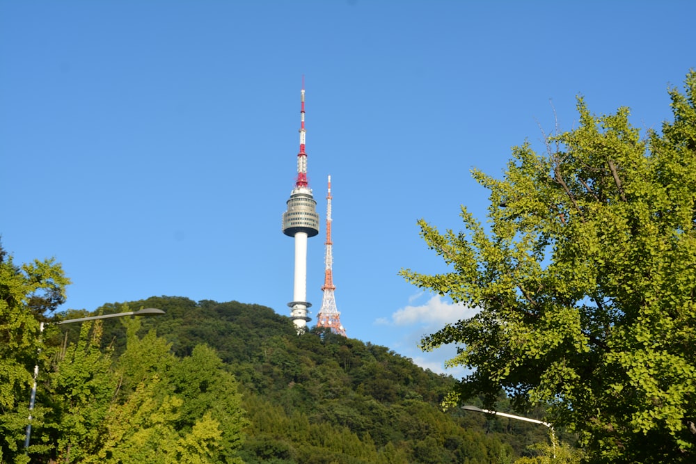 a tall tower on a hill