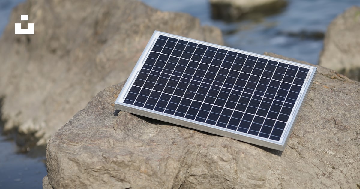 A solar panel on a rock photo – Free Grey Image on Unsplash