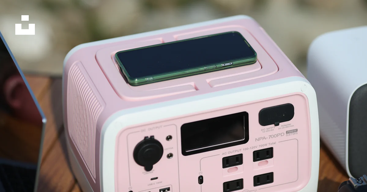 A pink handheld gaming device photo – Free Grey Image on Unsplash