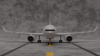 a white airplane on a runway