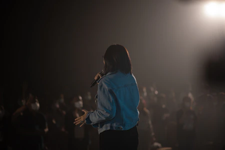 a person holding a microphone