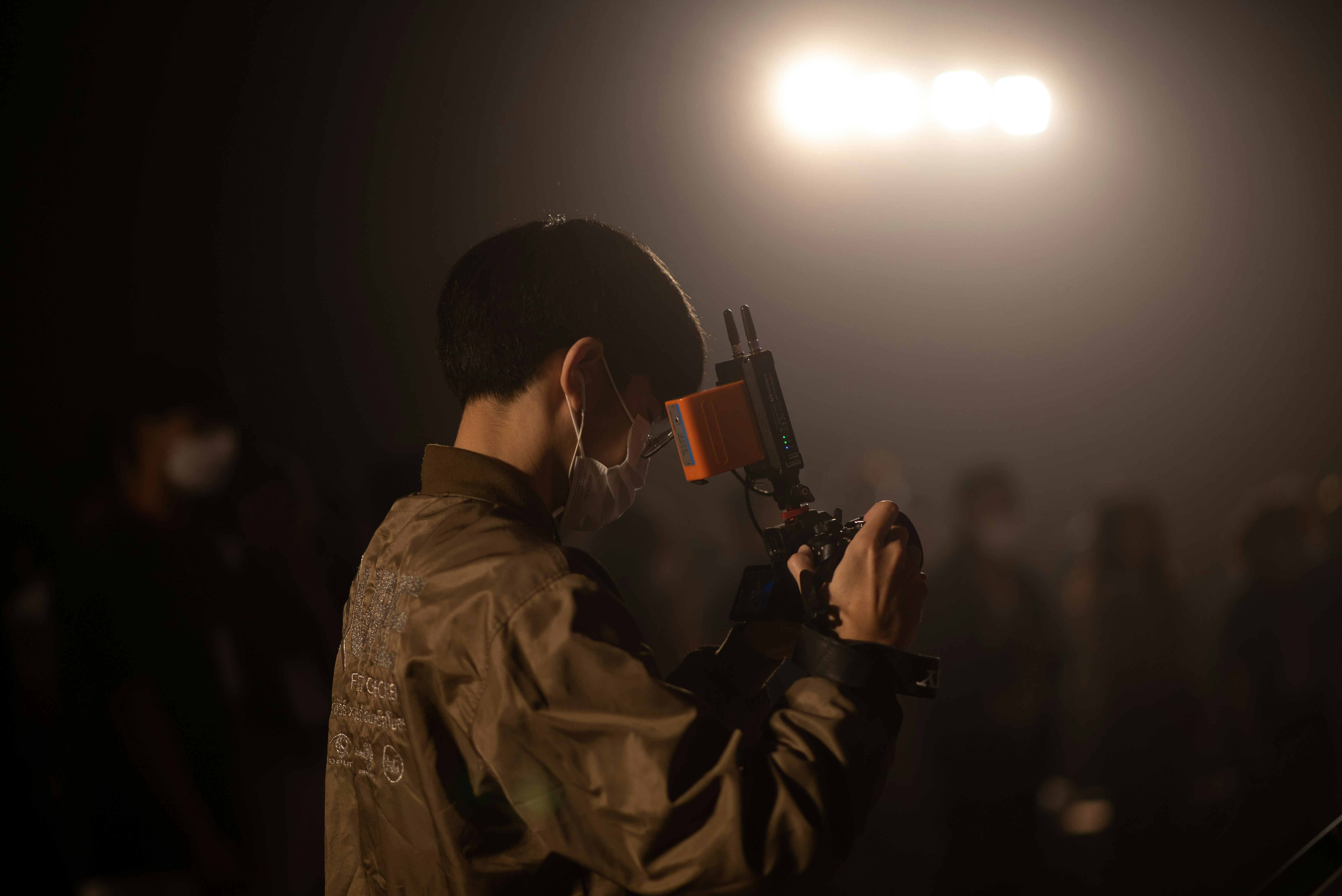a man wearing a mask and holding a gun