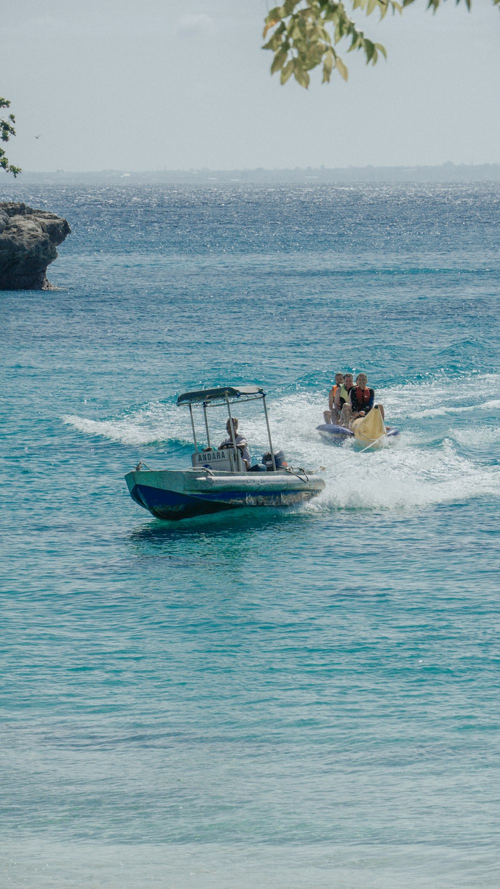 a boat travels through the water