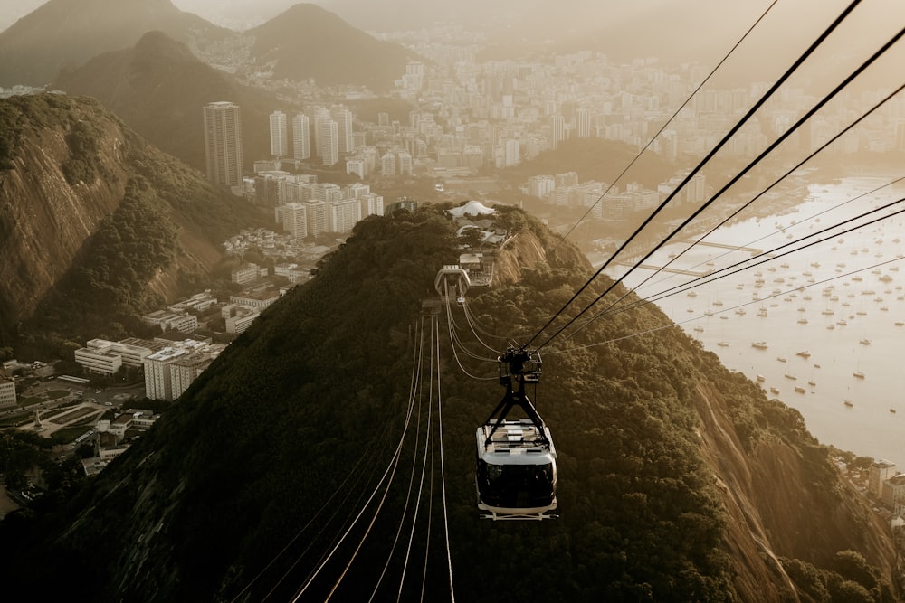 a cable car above a city