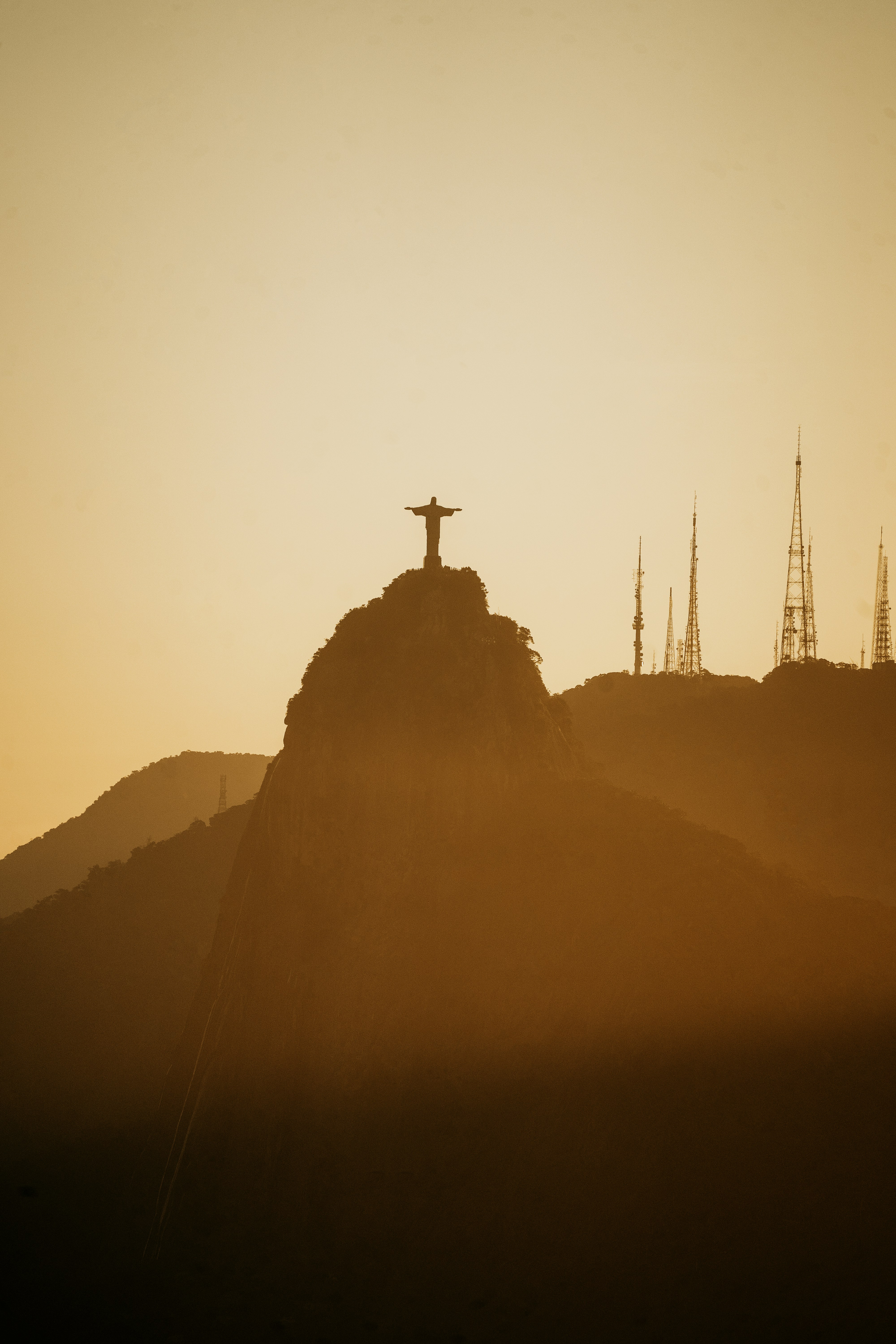 a cross on top of a mountain