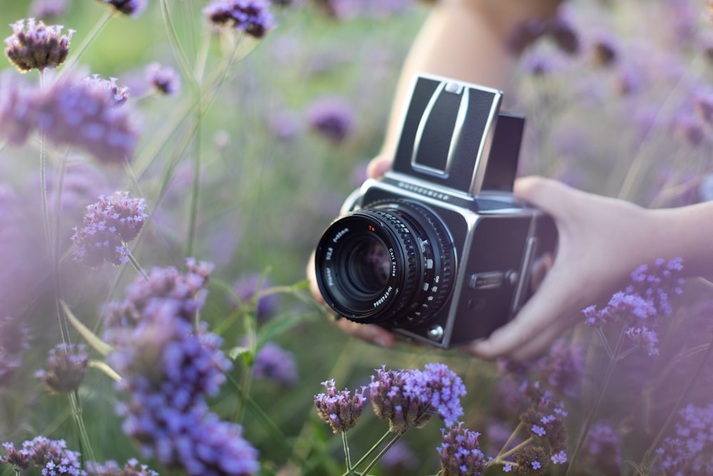 a person holding a camera