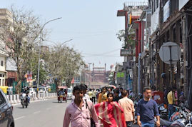 a busy street with people and vehicles