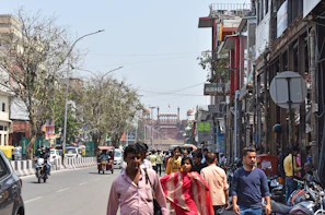 a busy street with people and vehicles