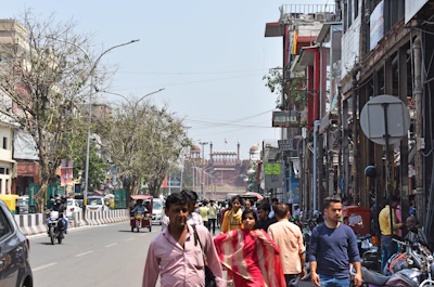 a busy street with people and vehicles